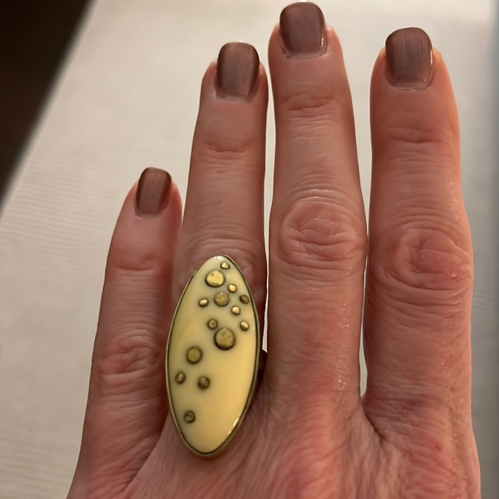 Unusual brass and ivory color ring - size 6.